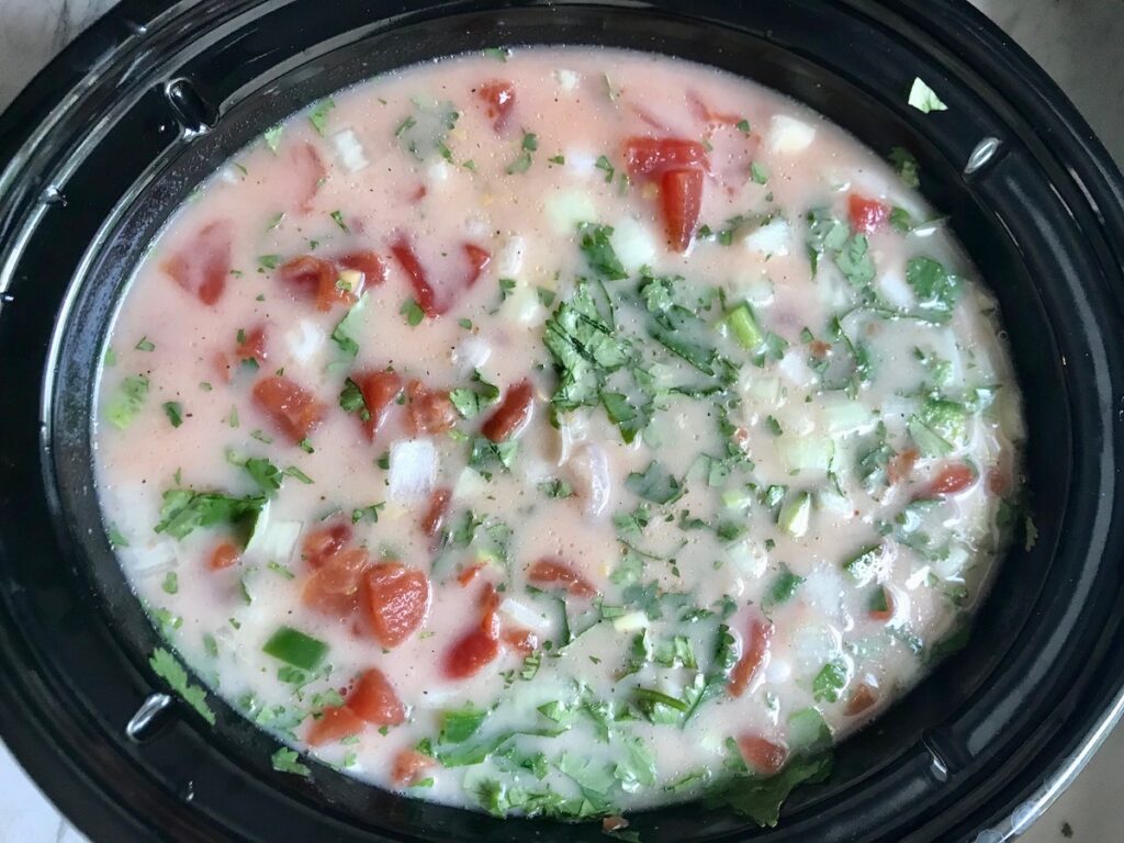 All ingredients in slow cooker for Brazilian Coconut Chicken stew.