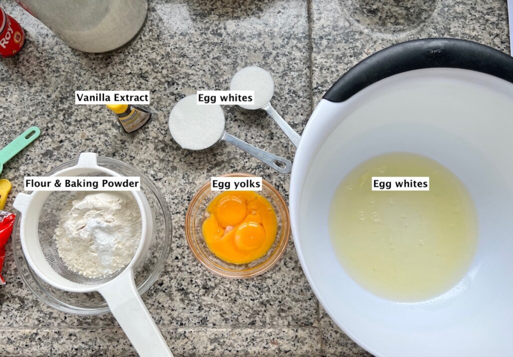 Ingredients measured out into bowls on counter for Brazilian Coconut Cake.