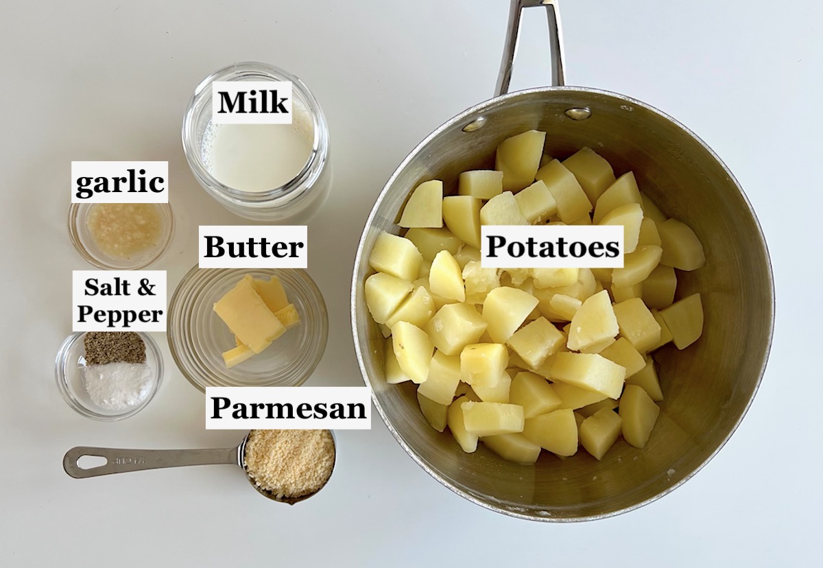 Ingredients prepped and measured out in bowls for the mashed potatoes for Brazilian Dutch Oven Shepherd's Pie.