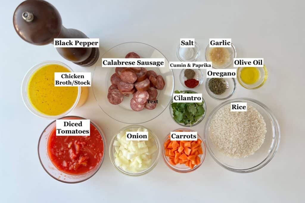 Ingredients prepped and measured out in bowls for Galinhada, Dutch oven chicken and rice.