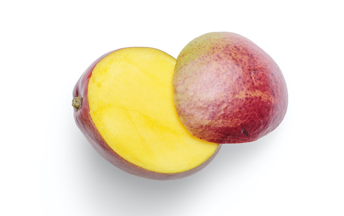 Side of a mango sliced off for Spicy Mango Salsa recipe.