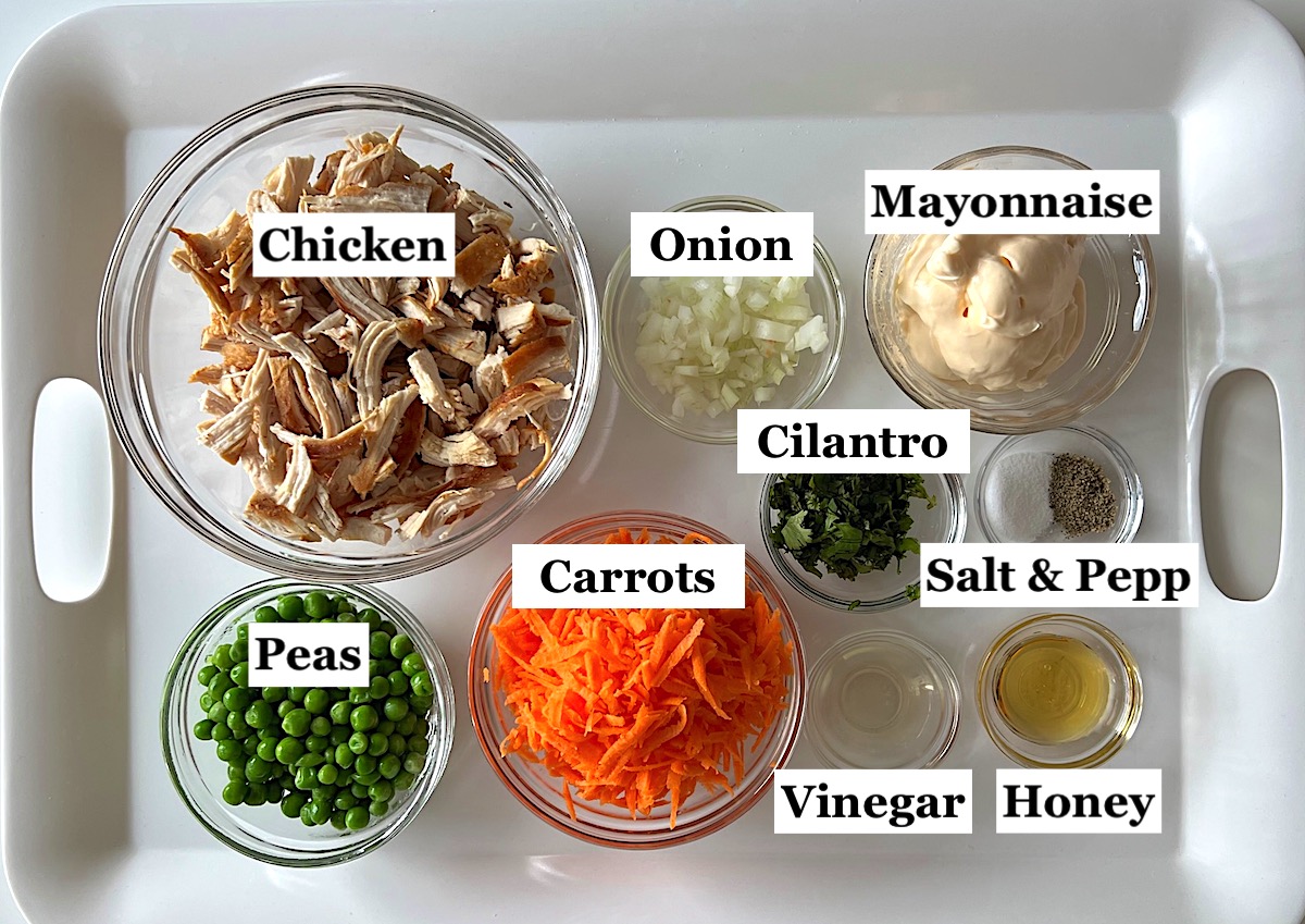 Ingredients prepped and measured out in bowls for Brazilian Chicken Salad.