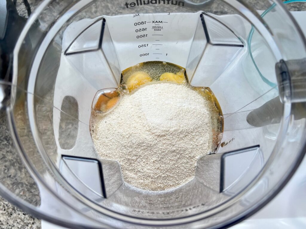 All ingredients for Cassava bread in a blender before blending with the flour added last.