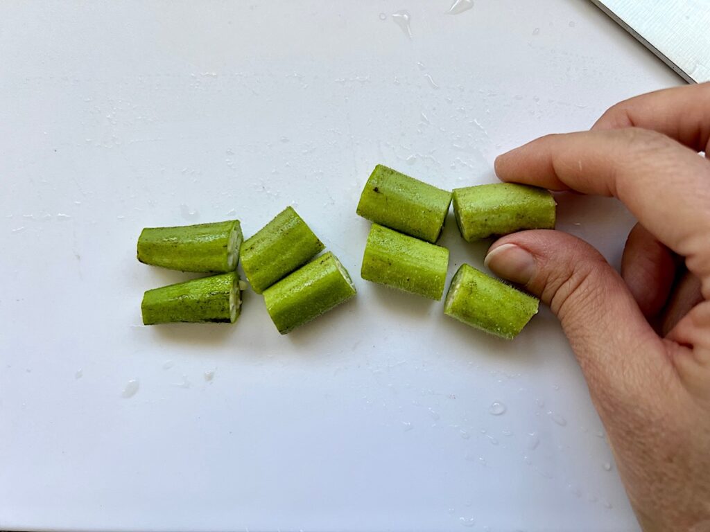 Fresh okra cut into 1 inch pieces for Breaded Okra in air fryer.