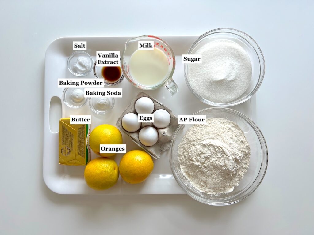 Ingredients prepped and measured out in bowls for Orange Bundt Cake recipe.